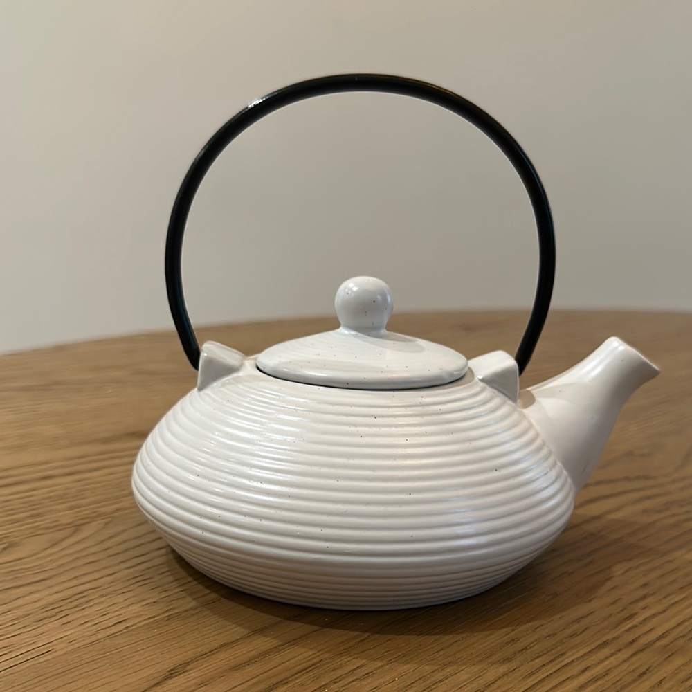 Elegant White Teapot with Black Handle